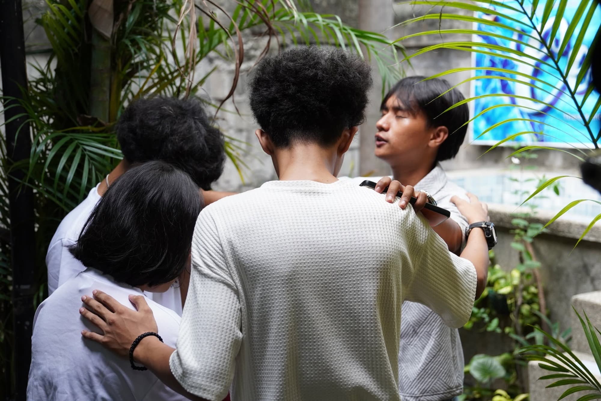 CARE Group praying together